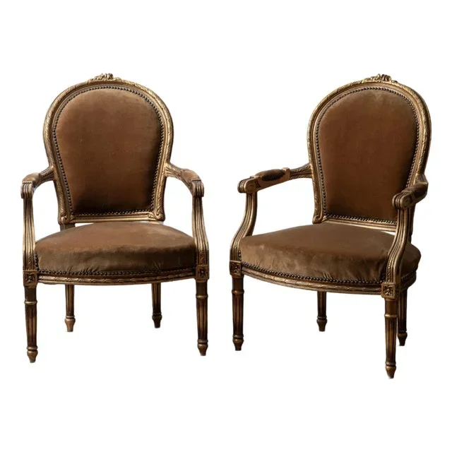 A Pair of Louis XVI-Style Giltwood Fauteuils
