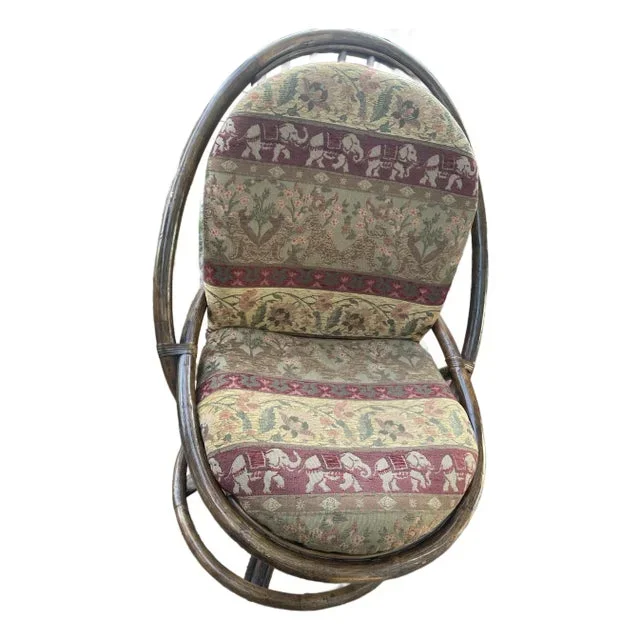Mid 20th Century Mid Century Boho Chic Swivel Rattan Rocker With Pad