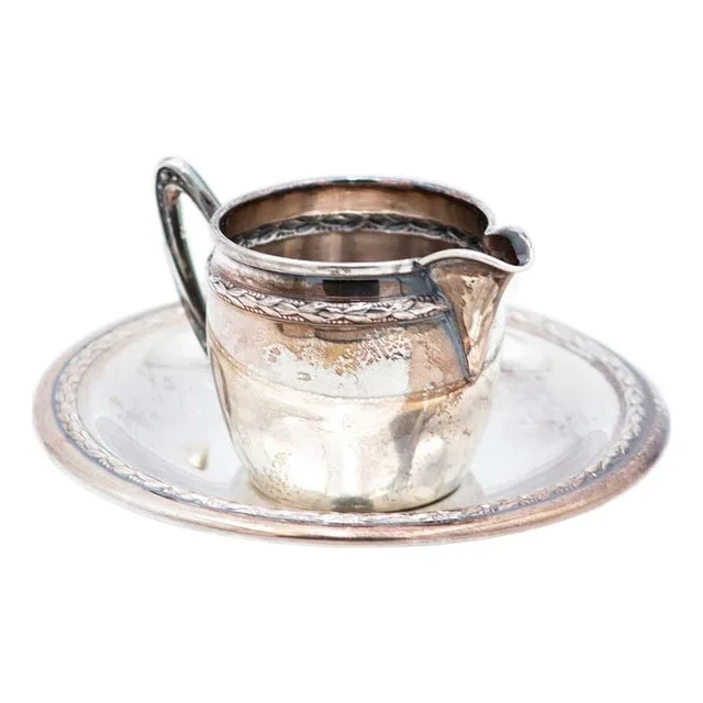 Silver Cup and Saucer with Reliefs and Friezes, Set of 2